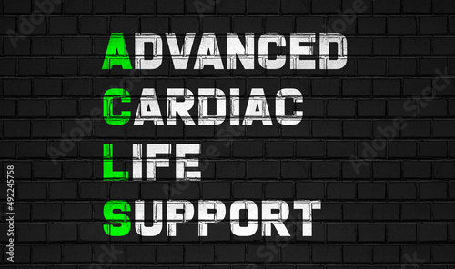 Advanced cardiac life support (ACLS) concept,healthcare abbreviations on black wall