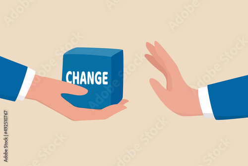Status quo bias, fear or refuse to change, comfort zone or conservative thinking, afraid of changing risk or resist to make decision concept, businessman hand denied or refuse to get change cube box.