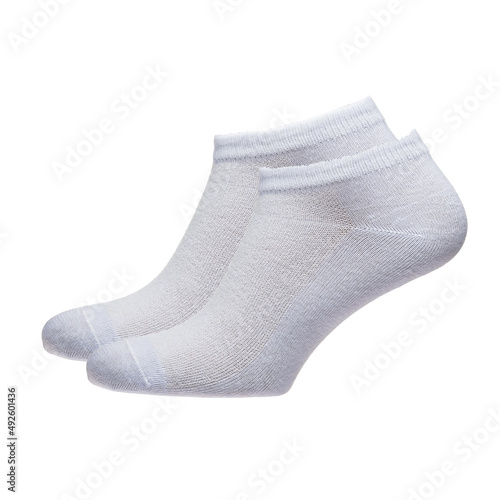 A pair of fabric socks stands on a white isolated background. Volumetric socks on a transparent mannequin. White socks.