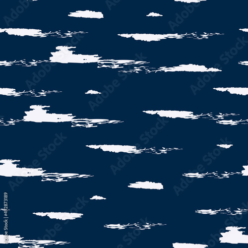 White brushstrokes on blue background pattern. 