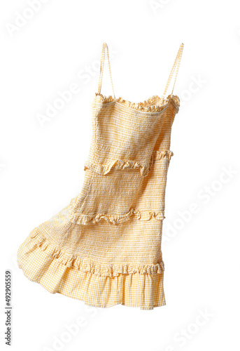 Flying yellow sundress on white background