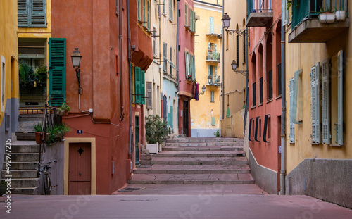 The colorful houses of the people of Nice, France, on a very nice and narrow street