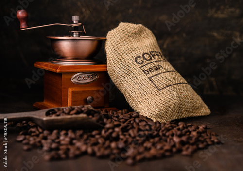 Coffee bean in bag, coffee grinder with scoop