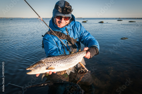 Happy angler with nice size seatrout