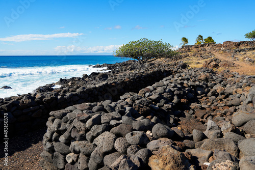 Ruins of traditional Hale (houses) in the ancient fishing village of the Lapakahi State Historical Park on the island of Hawai'i (Big Island) in the Pacific Ocean