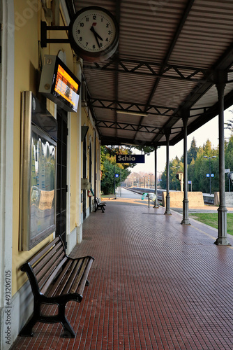 Schio (Vicenza, Italy) railway station, view of the bench, electronic scoreboard and track