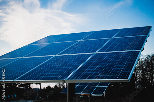 Chardon, Ohio, USA - 3-10-22: A large solar panel set up to power a small office building nearby