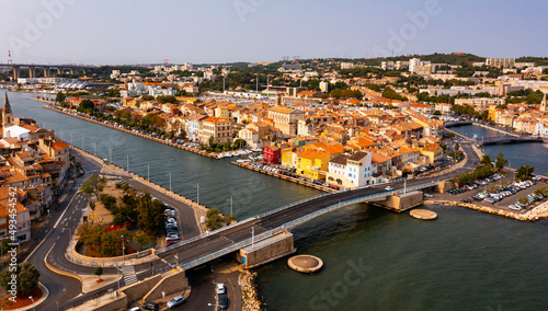 Aerial view of the administrative center with residential areas of the seaside town of Martigues, located on the Mediterranean ..coast, France