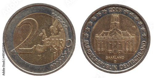 Germany - circa 2009 : a 2 Euro coin of Germany with a map of Europe and the historic church Ludwigskirche Saarbrücken, Saarland