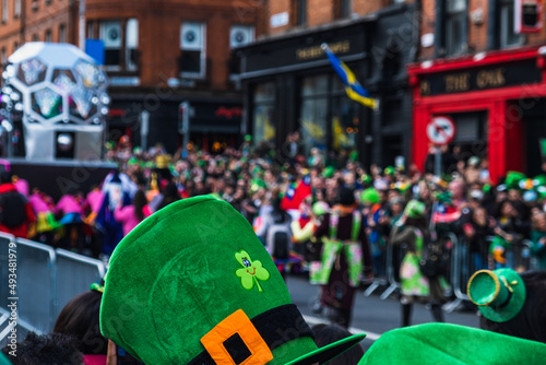 Saint Patrick's day parade in Dublin 2022, green hat with clover in the crowd
