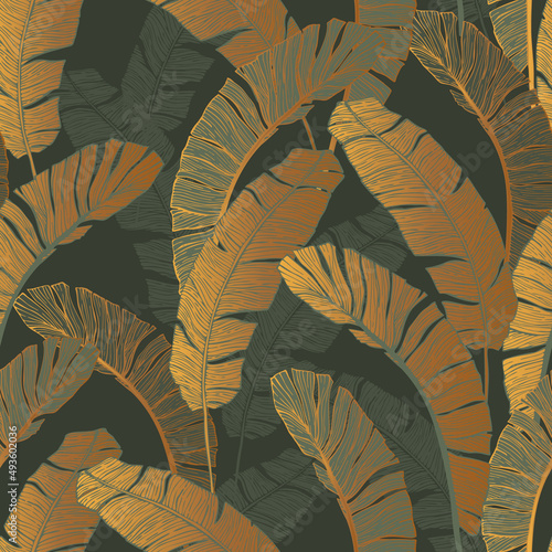 Seamless pattern of golden green tropical leaves.