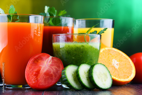 Glasses with fresh organic vegetable and fruit juices