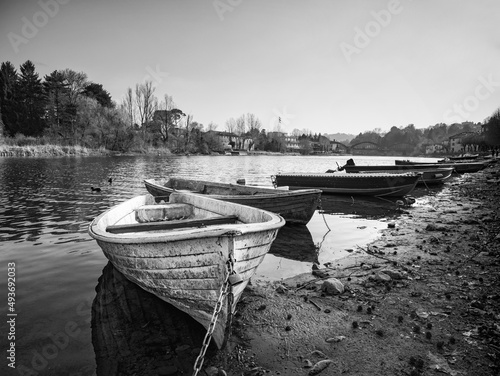 Old boat om adda river in Lombardy