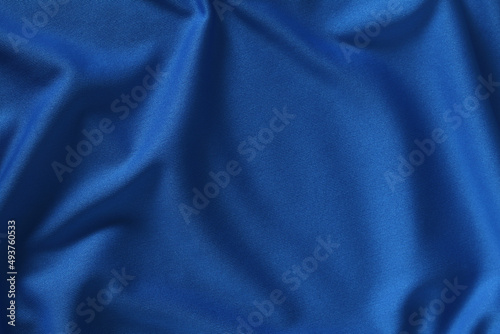 Blue fabric waves background texture/close up of a textile background