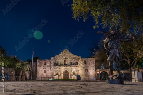 View of the San Antonio Alamo and Bronze Statue at Night