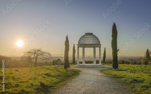 Beautiful view of a gazebo rotunda in a garden