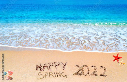 Happy Spring 2022 on a tropical beach