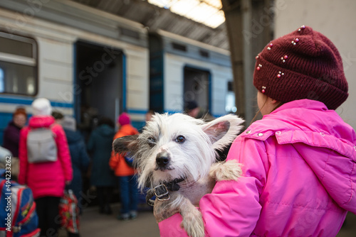 Ukrainian refugees on Lviv railway station waiting for train to escape to Europe