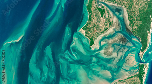 Satellite view of the coast of Mozambique aerial view of Inhaca Island, Mozambique, ocean and pristine islands. Africa. Element of this image is furnished by Nasa 