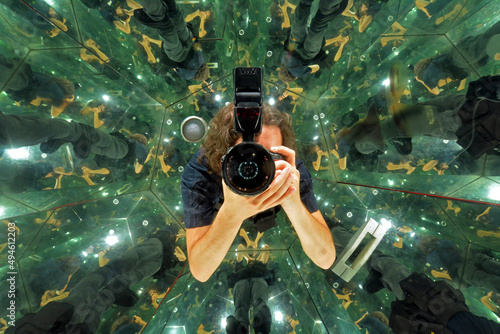 Portrait of a photographer in a kaleidoscope room