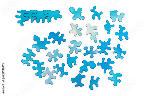 Blue puzzles on white background. Difficult, unusual task concept