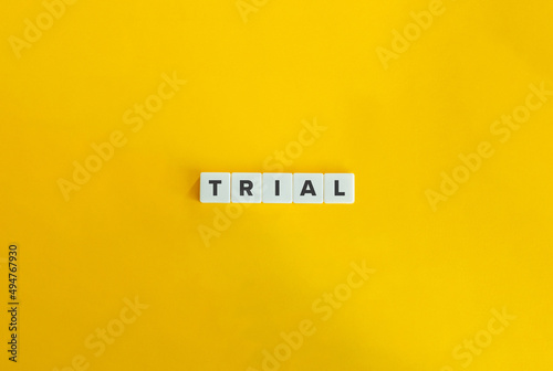 Trial Word on Letter Tiles on Yellow Background. Minimal Aesthetics.