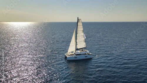 Sail Catamaran Floating At Calm Sea Aerial Photo 