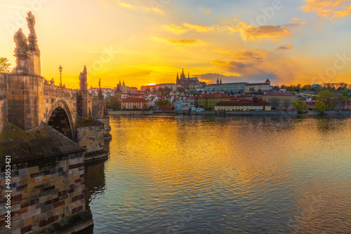 One of the most famous Prague views of the Hradčany skyline, which is taken from Charles Bridge at sunset, which sets directly behind the castle.