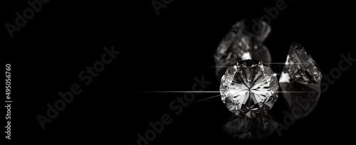 3D rendering illustration.Round cut diamond on black dark glossy background, rear light, shadow, caustics rays.