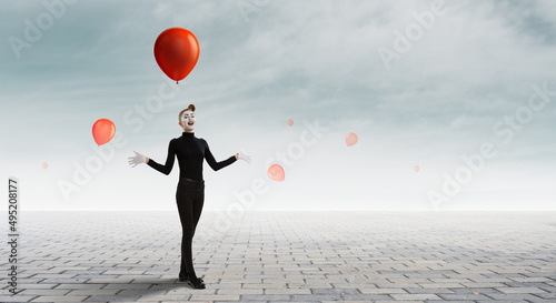 Female mime with white face