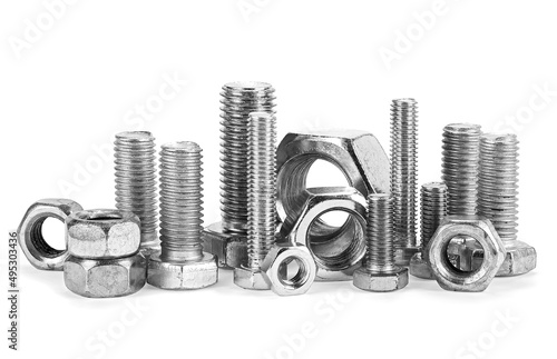 Large metal screws and nuts isolated on a white background. Industrial steel hardware bolts and nuts.