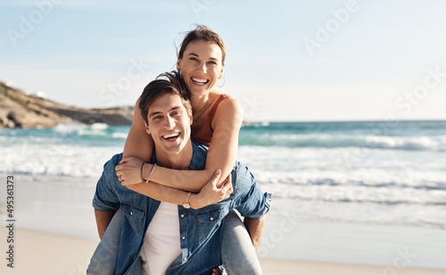 The beach puts everyone in a better mood. Shot of a middle aged couple spending the day at the beach.