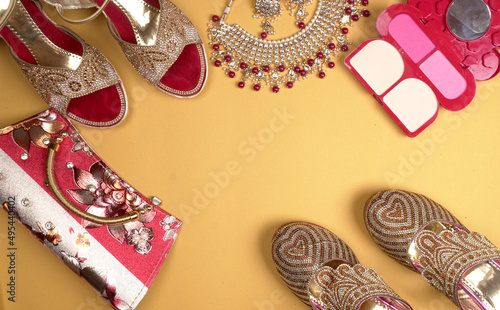 Bridal wedding jewelry and shoes, make up accessories on beautiful background. Top view, Space for text.