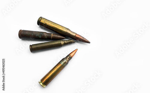 isolated old ak and m16 bullets on white background, soft and selective focus.