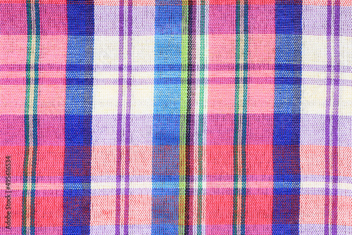Colorful thai loincloth pattern as background. bright plaid fabric of thailand. 