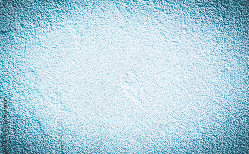 whitr blue textured horizontal cement background with vignette. 
