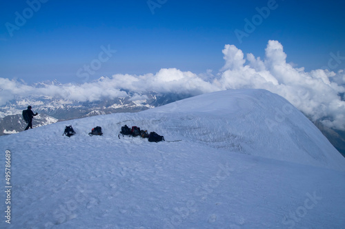 backpoacks on mountain, Gran Paradiso, Europe Alps