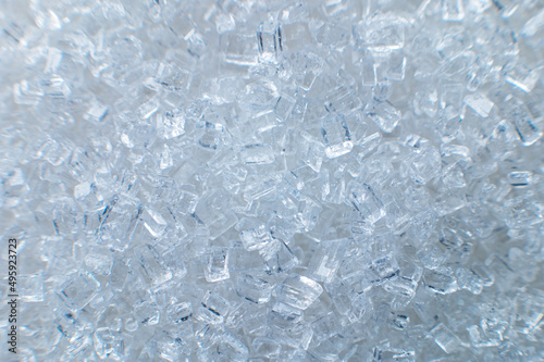 Sugar crystals. Great zoom, extreme macro. For illustration, texturing and collage. Sugar in shallow depth of field