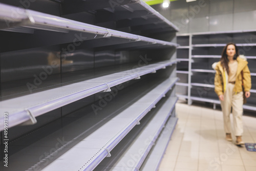 View of empty supermarket shelves, grocery store work stoppage closes, sanctions and embargo, panic buying with supplies and goods shortage, food crisis and deficit concept