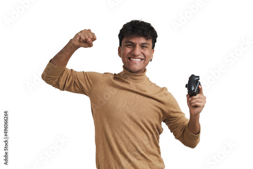 Young peruvian man man playing video games with a joystick. Isolated over white background.