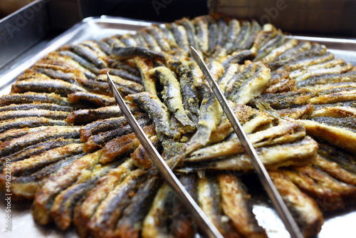 Grilled anchovies (Turkish: Hamsi) on the restaurant table.