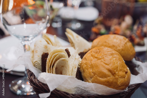 Freshly baked ciabatta bread on wooden table