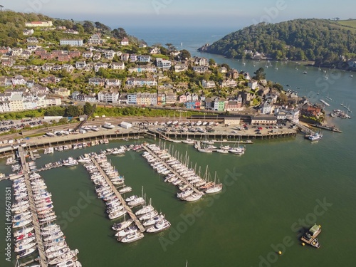 Aerial view of Kingswear and Dartmouth, Devon, with boats moored on piers on the river Dart, England.