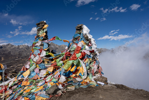 Shot of some trash on top of mount Everest under blue sky