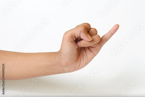 Adult female hand showing pinky little finger or gesture of making a promise on a white background