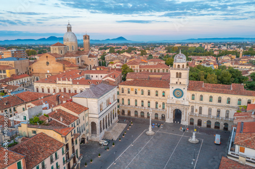 Sunrise view of Torre dell'Orologio and Cathedral of Santa Maria Assunta in Italian town Padua