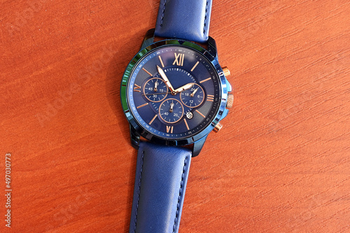 men's stylish modern wrist watch with a leather strap.