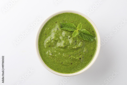 Green Mint Chutney or Pudina Chutney made with Coriander, Pudina & Spices. selective focus