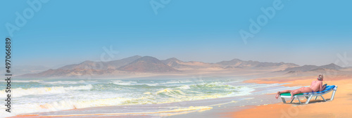 Blond woman sunbathing on the atlantic ocean beach
