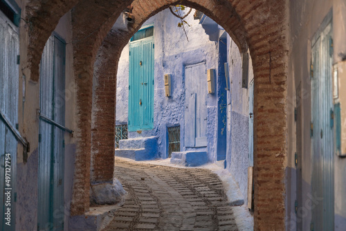 Morocco, Chefchaouen, Narrow alley and traditional blue houses